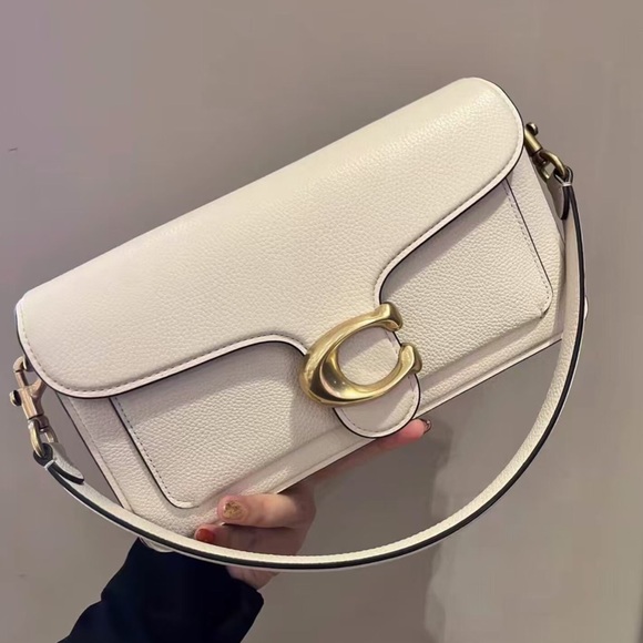 Coach Handbags - Coach Ivory Shoulder Bag with Gold Accents